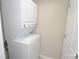 Laundry closet with stackable washer and dryer at 403 N Ransom St, Gastonia, NC 28052