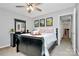 Bedroom with a king-size bed and built-in dresser at 6019 Heath Valley Rd, Charlotte, NC 28210