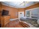 Charming bedroom with wood flooring and large windows at 408 W 5Th Ave, Gastonia, NC 28052
