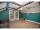 Spacious bonus room with teal walls and a ceiling fan at 408 W 5Th Ave, Gastonia, NC 28052