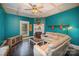 Teal living room with sectional sofa and fireplace at 408 W 5Th Ave, Gastonia, NC 28052