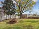 Large backyard with fire pit and storage shed at 3645 Brookville Sw Ave, Concord, NC 28027