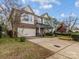 Two-story house with stone accents and a metal roof at 3645 Brookville Sw Ave, Concord, NC 28027