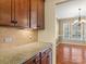 Kitchen features granite countertops and ample cabinet space at 3645 Brookville Sw Ave, Concord, NC 28027