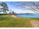 Relaxing sandy beach with grassy area and calm lake views at 4848 Kiser Island Dr, Terrell, NC 28682