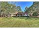 One-story home with a large yard and established trees at 608 Raintree Dr # 19A, Matthews, NC 28104