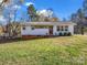 Charming ranch home with a well-maintained lawn and landscaping at 1336 Lithia Springs Rd, Shelby, NC 28150