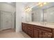 Bathroom with double vanity and tile floor at 3003 Springs Farm Ln, Charlotte, NC 28226