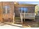 Wooden deck with stairs leading to the ground at 3003 Springs Farm Ln, Charlotte, NC 28226