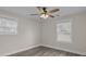 Bedroom with ceiling fan, hardwood floors and window at 8901 Shadowood Ln, Charlotte, NC 28273