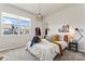 Cozy bedroom with a queen bed and large window at 9232 Widden Way, Charlotte, NC 28269