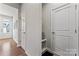 Hallway with built-in bench, coat hooks and additional storage at 9232 Widden Way, Charlotte, NC 28269