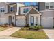 Modern townhome community with attached garages and well-maintained landscaping at 9232 Widden Way, Charlotte, NC 28269