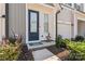 Stylish front door with wreath and sidelights, welcoming entryway at 9232 Widden Way, Charlotte, NC 28269