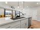 Modern kitchen with white cabinets, stainless steel appliances, and a large island at 9232 Widden Way, Charlotte, NC 28269