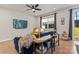 Cozy living area with a blue sofa, yellow armchair, and large TV at 9232 Widden Way, Charlotte, NC 28269