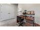 Home office with a desk and double door closet at 9232 Widden Way, Charlotte, NC 28269