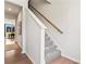 Modern staircase with carpeted steps and wood flooring at 9232 Widden Way, Charlotte, NC 28269