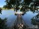 Private wooden dock extending over calm lake water at 1050 21St Ave, Hickory, NC 28601