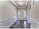 Bright entryway with wood-look floors and white wainscoting at 112 N Dunlavin Way # 1, Mooresville, NC 28115