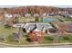 Community clubhouse with pool and surrounding homes at 139 Forest Walk Way, Mooresville, NC 28115