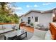 Spacious back deck with seating area, grill, and view of backyard at 1612 Lasalle St, Charlotte, NC 28216