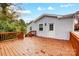 Large deck with wooden railings and stairs at 1612 Lasalle St, Charlotte, NC 28216