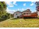 Back of house showing deck, steps and yard at 1612 Lasalle St, Charlotte, NC 28216