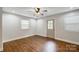 Spacious living room with wood floors and access to backyard at 1612 Lasalle St, Charlotte, NC 28216