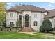 Stunning two-story home with stone accents and a grand entrance at 18917 Peninsula Point Dr, Cornelius, NC 28031