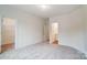 Spacious bedroom with walk-in closet and access to bathroom at 2015 Cedar Falls Dr # 72, Waxhaw, NC 28173