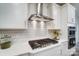 Modern kitchen with gas cooktop and stylish backsplash at 2015 Cedar Falls Dr # 72, Waxhaw, NC 28173