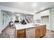 Modern kitchen with island, stainless steel appliances, and white cabinets at 2015 Cedar Falls Dr # 72, Waxhaw, NC 28173