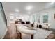 Open concept living room with kitchen and natural light at 2015 Cedar Falls Dr # 72, Waxhaw, NC 28173