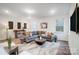 Spacious living room with sectional sofa and wood-style flooring at 2015 Cedar Falls Dr # 72, Waxhaw, NC 28173
