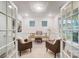Home office with two armchairs, built-in shelving and French doors at 2015 Cedar Falls Dr # 72, Waxhaw, NC 28173