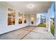 Covered patio with concrete flooring and access to backyard at 2015 Cedar Falls Dr # 72, Waxhaw, NC 28173