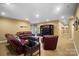 Finished basement with leather furniture and entertainment center at 226 Hermance Ln, Mooresville, NC 28117