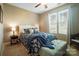 Bedroom with a queen-size bed and window seating at 226 Hermance Ln, Mooresville, NC 28117