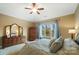 Main bedroom with large windows and wooded views at 226 Hermance Ln, Mooresville, NC 28117