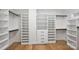 Large walk-in closet with ample shelving and drawers at 4918 Buckingham Dr, Charlotte, NC 28209