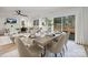 Open concept dining area with a wooden table and chairs overlooking the living room at 507 Kentbrook Dr, Charlotte, NC 28213