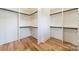 Large walk-in closet with ample shelving and hanging space at 628 Kenlough Dr, Charlotte, NC 28209