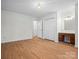 Bright bedroom with hardwood floors, double closets and access to hallway at 124 Ashleigh Ct, Fort Mill, SC 29715