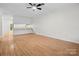 Living room with wood floors and ceiling fan at 124 Ashleigh Ct, Fort Mill, SC 29715