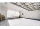 Garage with open door and painted floor at 12816 Cumberland Cove Dr, Charlotte, NC 28273