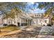 Two-story house with white siding, attached garage, and landscaping at 13401 Centennial Commons Pkwy, Huntersville, NC 28078