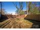 Large backyard with wooden fence and shed at 1721 Pegram St, Charlotte, NC 28205