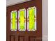 Elegant stained glass detail on a wood door at 1721 Pegram St, Charlotte, NC 28205