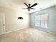 Bright bedroom with ceiling fan and window coverings at 3248 Margellina Dr, Charlotte, NC 28210